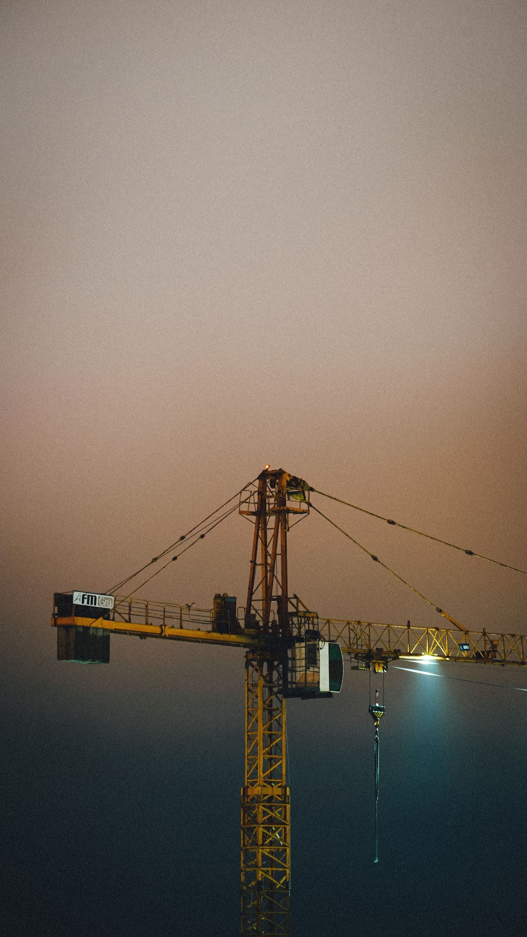 Project site emerging from morning mist before the crew arrives